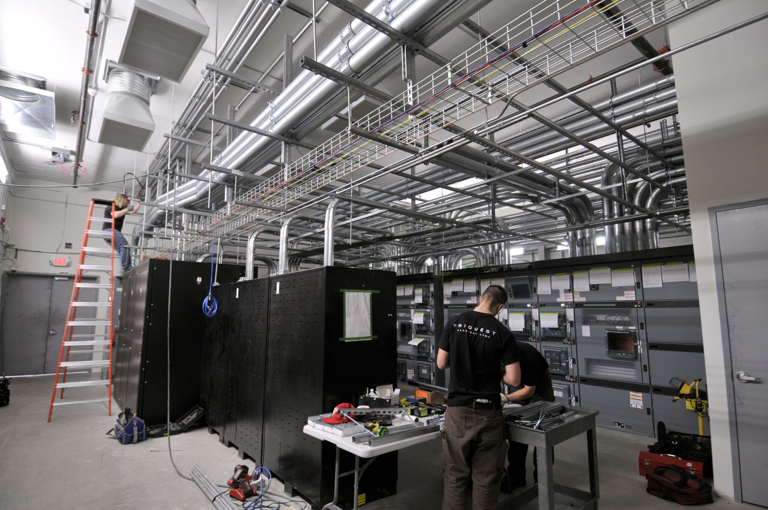 Two Electrician Install in Control Panel
